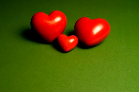 Three red hearts Stock Photos