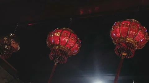 Three red lamps decoration during Chinese New Year celebration Stock Footage 134282071