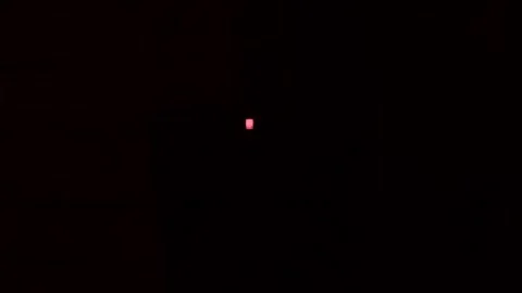 Three red LED indicators blinking in the darkness. Stock Footage 246017237