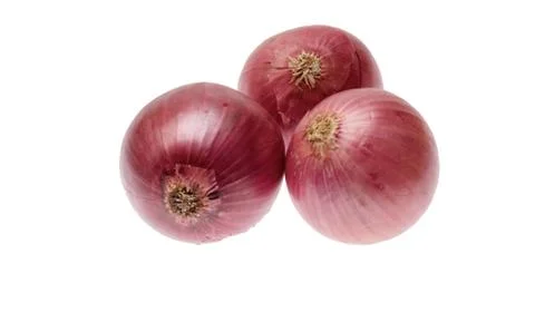 Three red onions on white background Stock Photos