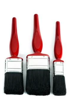 Three red paint brushes Stock Photos