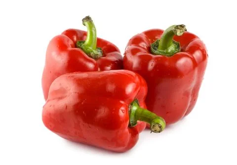 Three red peppers Stock Photos