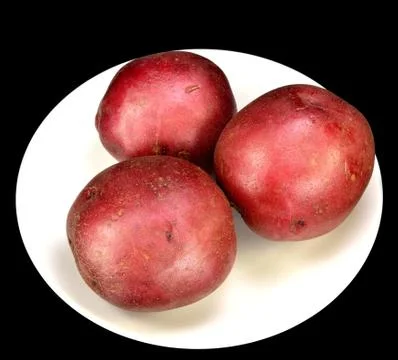 Three red potatoes Stock Photos