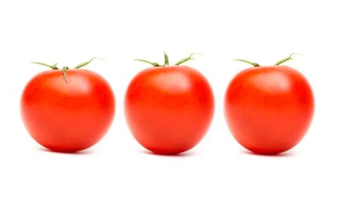 Three red ripe tomatoes isolated on white background Stock Photos