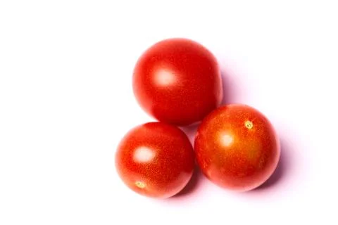 Three red tomatoes isolated on white background Stock Photos
