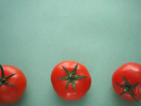 Three red tomatoes. Stock Photos