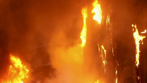 Three rescuers enter the burning building Vídeos de archivo 196017994