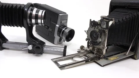 Three  Retro camera with a macro prefix. Stock Footage 112294428