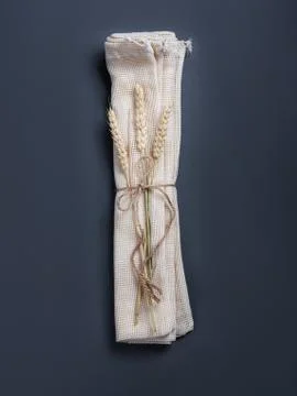 Three reusable string bags with three branches of wheat. Stock Photos