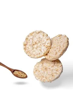 Three rice cake flying idea with wooden spoon Stock Photos