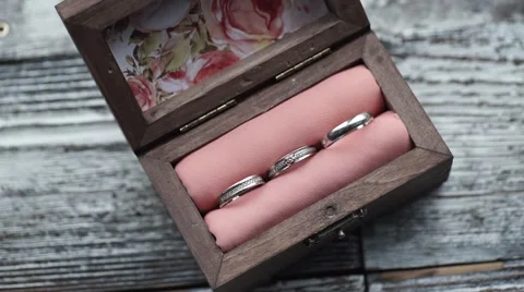 Three rings in a box Stock Footage 61040951