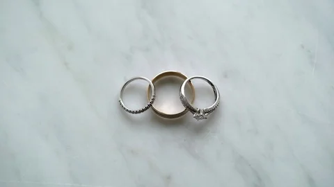 Three rings on marble Stock Footage 79604581