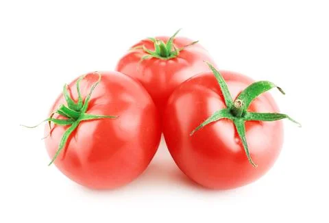 Three ripe, fresh red tomatoes with green stems isolated on a clean white b.. Stock Photos