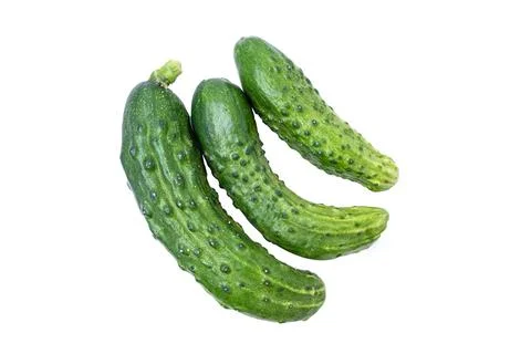 Three ripe green cucumbersisolate on a white background, top view Stock Photos