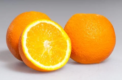 Three ripe oranges Stock Photos