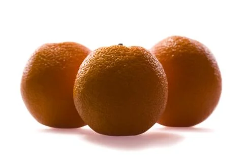 Three ripe oranges Stock Photos
