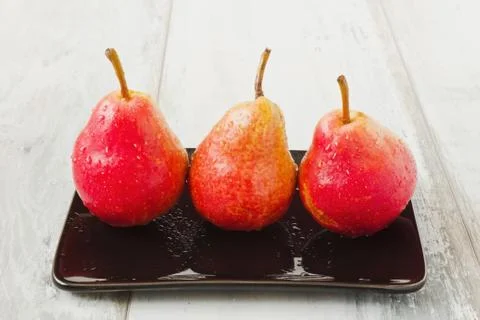 Three ripe  pears Stock Photos