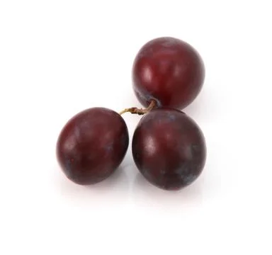 Three ripe plums Foto stock