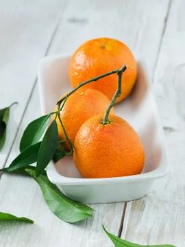 Three ripe tangerines Stock Photos