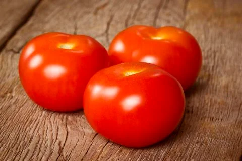 Three ripe tomatoes Stock Photos