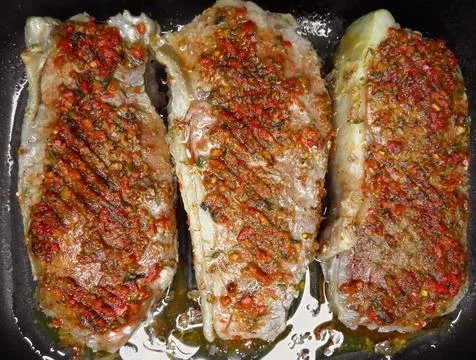 Three roasted beef steaks Stock Photos