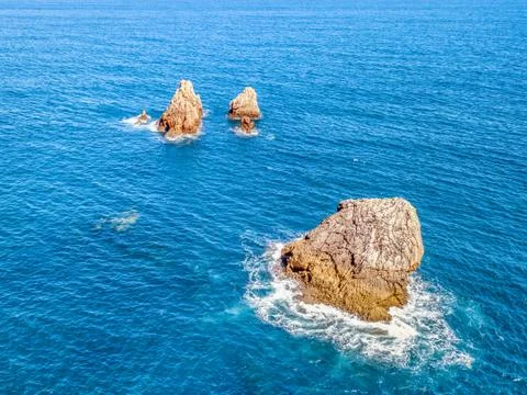 Three rocks in the sea Foto stock