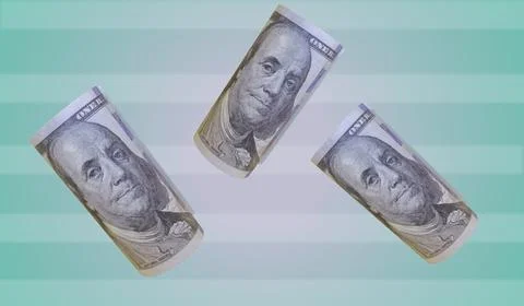 Three Rolled dollar Bills Gracefully Floating Against a Teal Striped Backgr.. Stock Photos