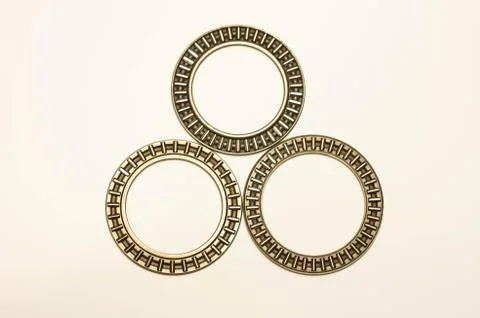 Three roller bearings on a white background Stock Photos