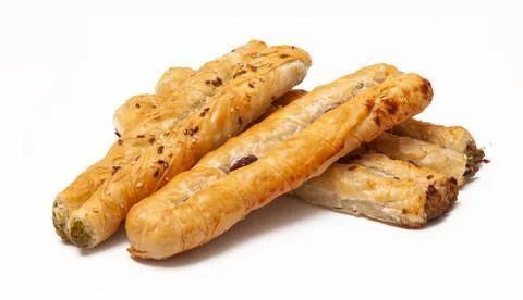 Three rollinis with different fillings on a white background Stock Photos