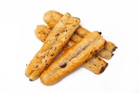 Three rollinis with different fillings on a white background Stock Photos