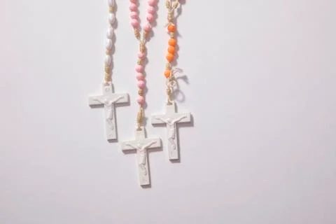 Three rosaries in different colours Stock Photos
