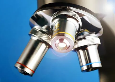 Three rotating lenses on a microscope Stock Photos