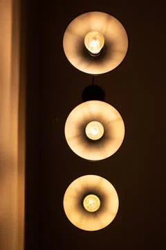 Three round lamps on the ceiling, bottom view Stock Photos
