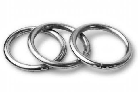Three round washers,perfect for various applications,captured in a clean and Stock Photos