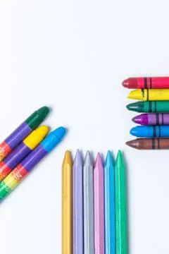 Three rows of colored pencils on a white background.  Stock Photos