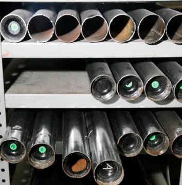Three rows of metal tubes Stock Photos