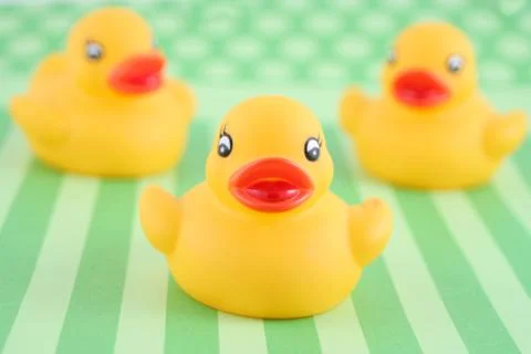 Three rubber duckies Stock Photos
