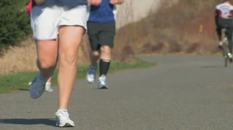 Three runners In park Stock Footage 646041