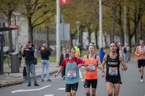 Three Runners At The TCS Marathon At Amsterdam The Netherlands 19-10-2025 Stockfoto's