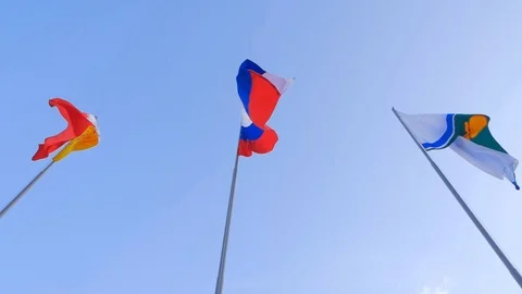 Three Russian flags fluttering in the wind against the sky. Stock Footage 104515620
