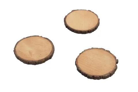 Three rustic wooden round discs isolated on white background. Blank lumber .. Stock Photos