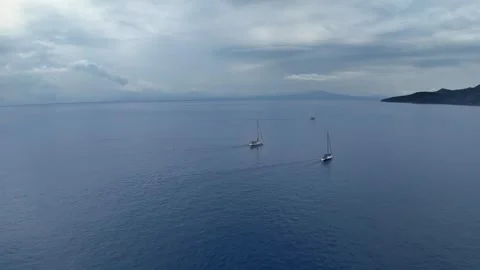 Three Sailing Yachts Under Stormy Mediterranean Sky Stock Footage 336706036