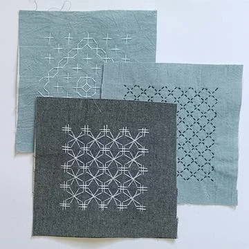 Three sashiko embroidery samples flat lay Stock Photos