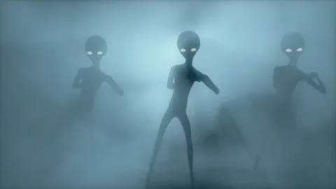 Three scary gray aliens dancing on a dark smoky background. UFO futuristic Stock Footage 273231212