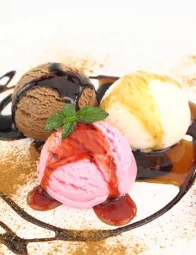 Three scoops of ice cream Stock Photos