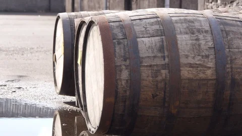 Three Scottish Whiskey Barrels Outside Distillery on a Sunny Day 스톡 동영상 97615751