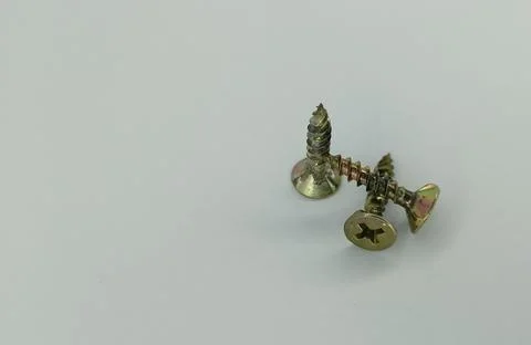 Three screws Stock Photos