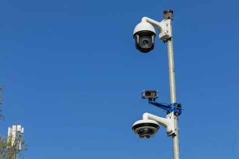 Three security cameras on a pole, a high resolution camera with night vision, Stock Photos