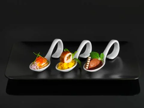 Three serving spoons Stock Photos