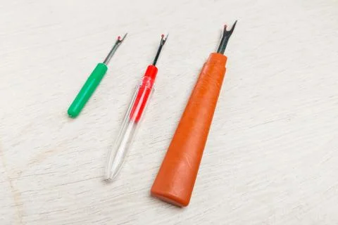 Three sewing tool thread pins to open wrong stitches Stock Photos